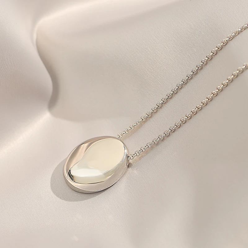 Sculpted Oval Pendant Necklace